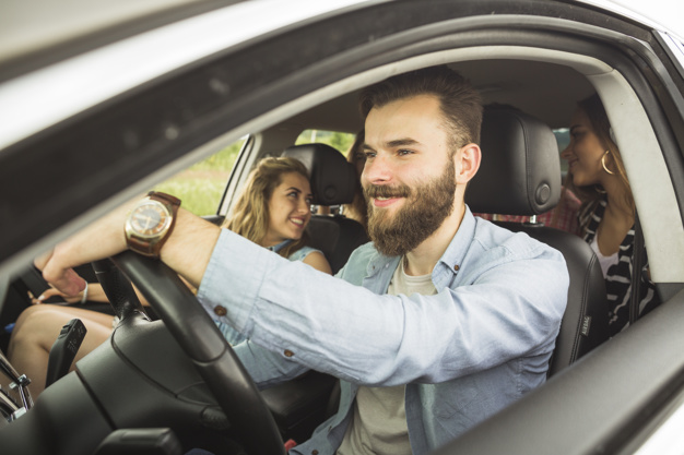 Handsome Man With His Friends Travelling Car 23 2147874597, Entrust Insurance St. Clair Shores, MI and Southeast Michigan